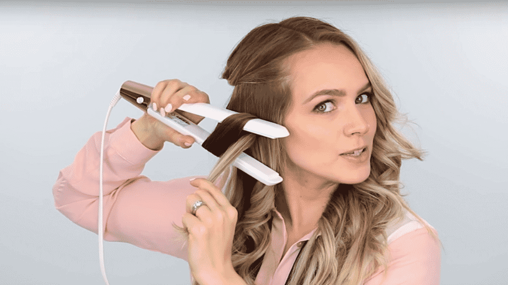 Use curlers and flat irons to tone down hair color
